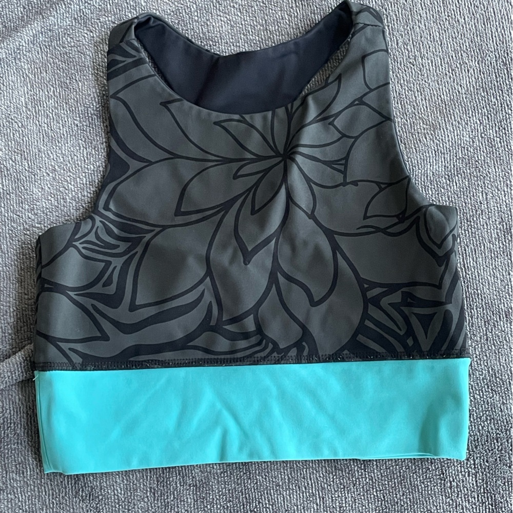 Black and aqua blue high neck sports bra with floral pattern